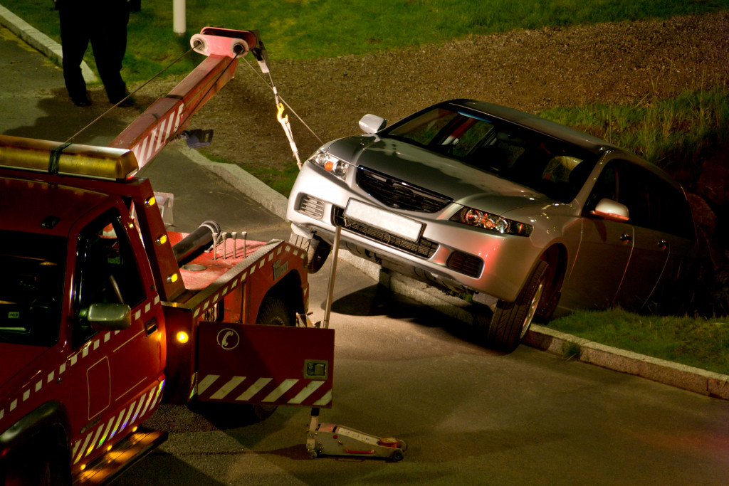 A truck rescuing a car