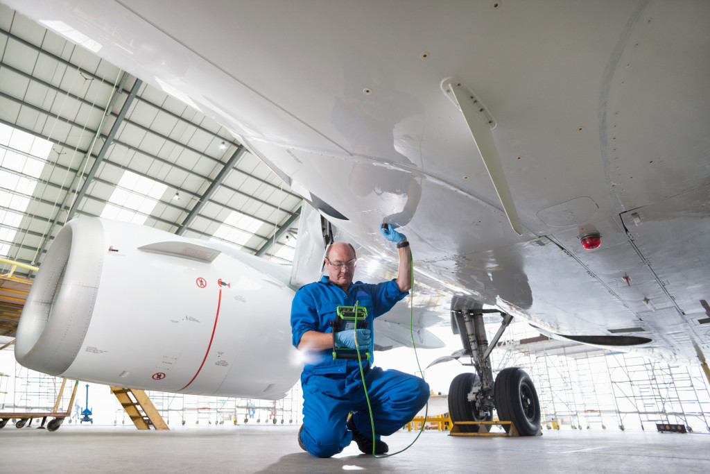 mechanic testing an aircraft