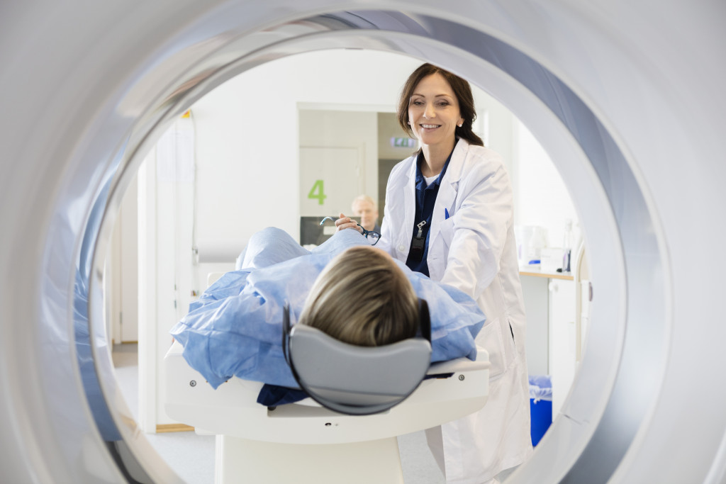 A doctor diagnosing a patient with an MRI