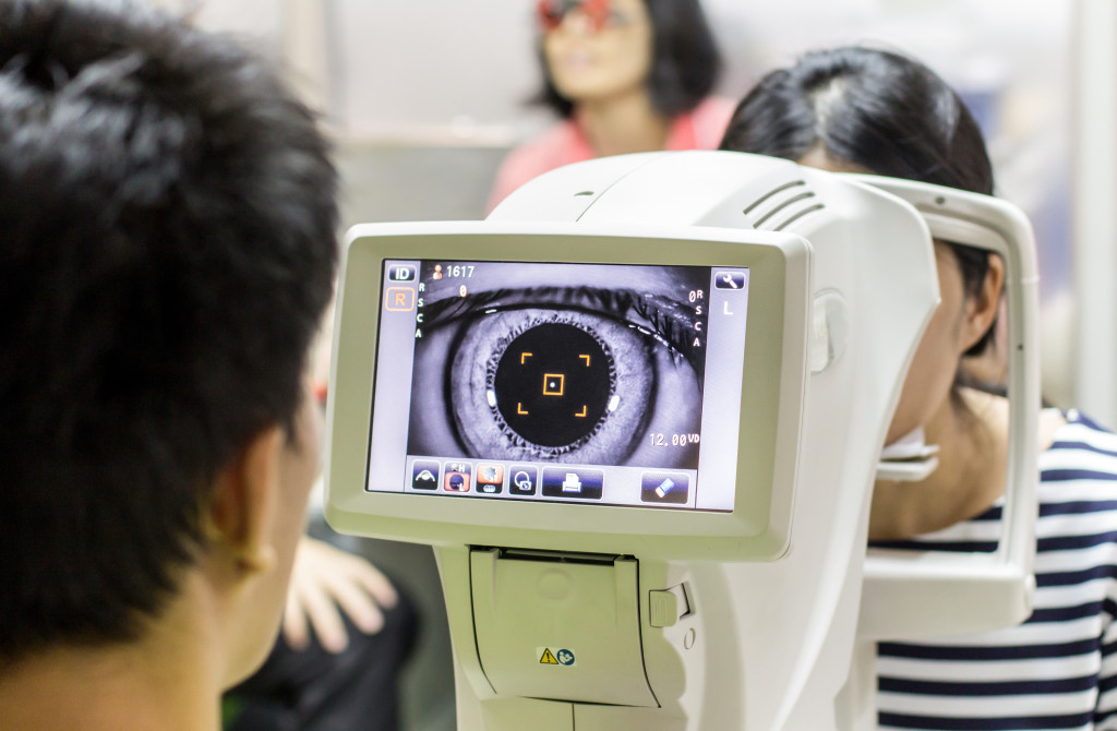 a patient getting their eyes checked