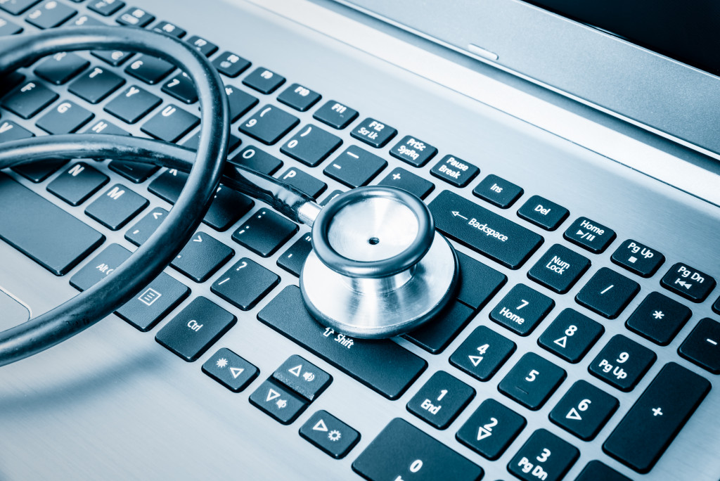 A stethoscope on a laptop keyboard