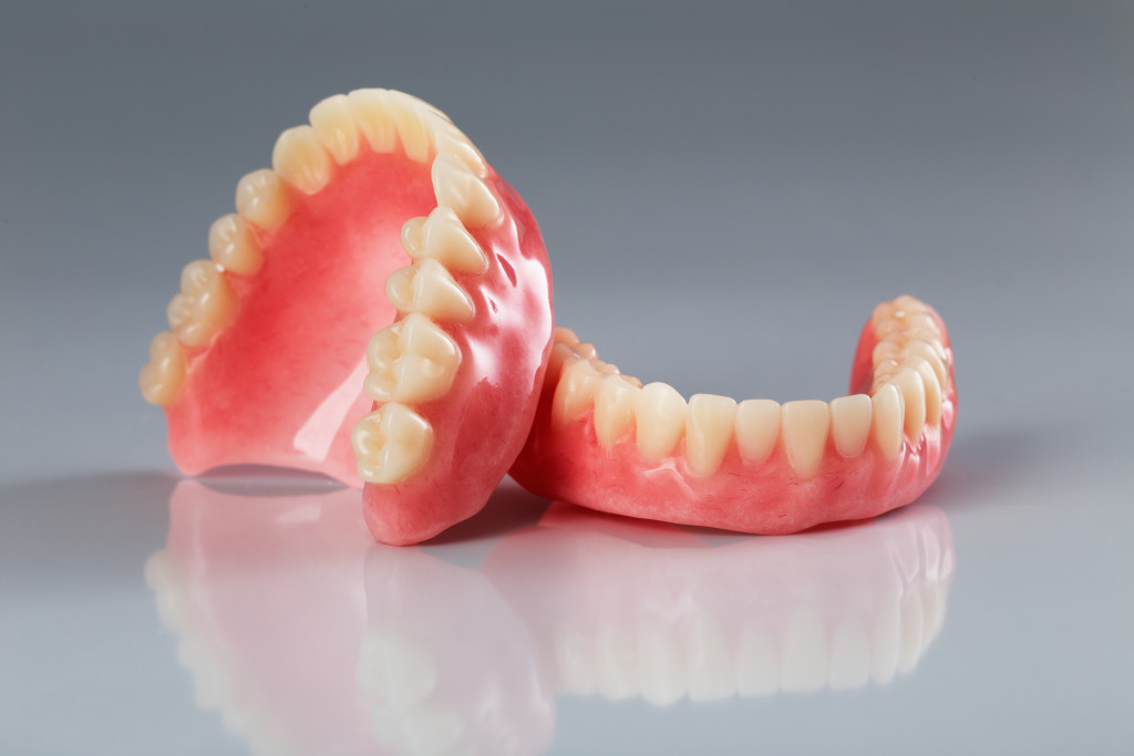 oral health concept shown through teeth models