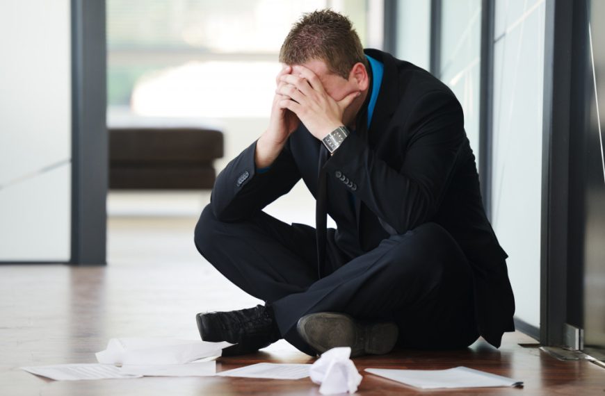 stressed man on the floor