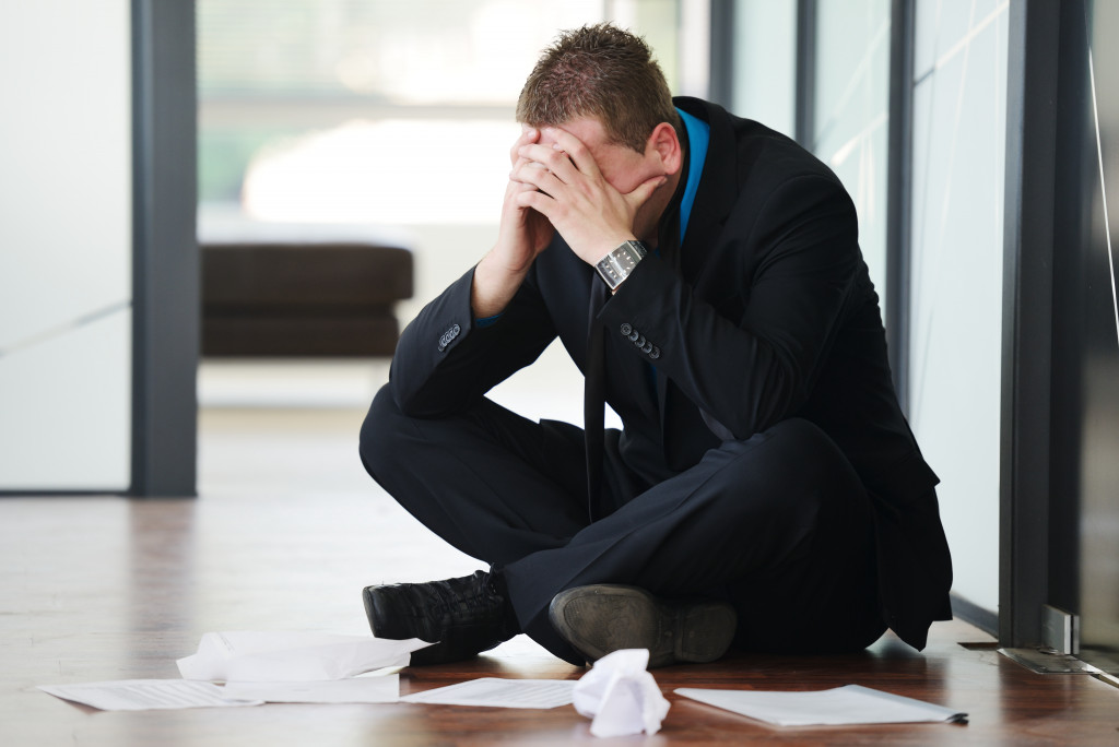 stressed man on the floor