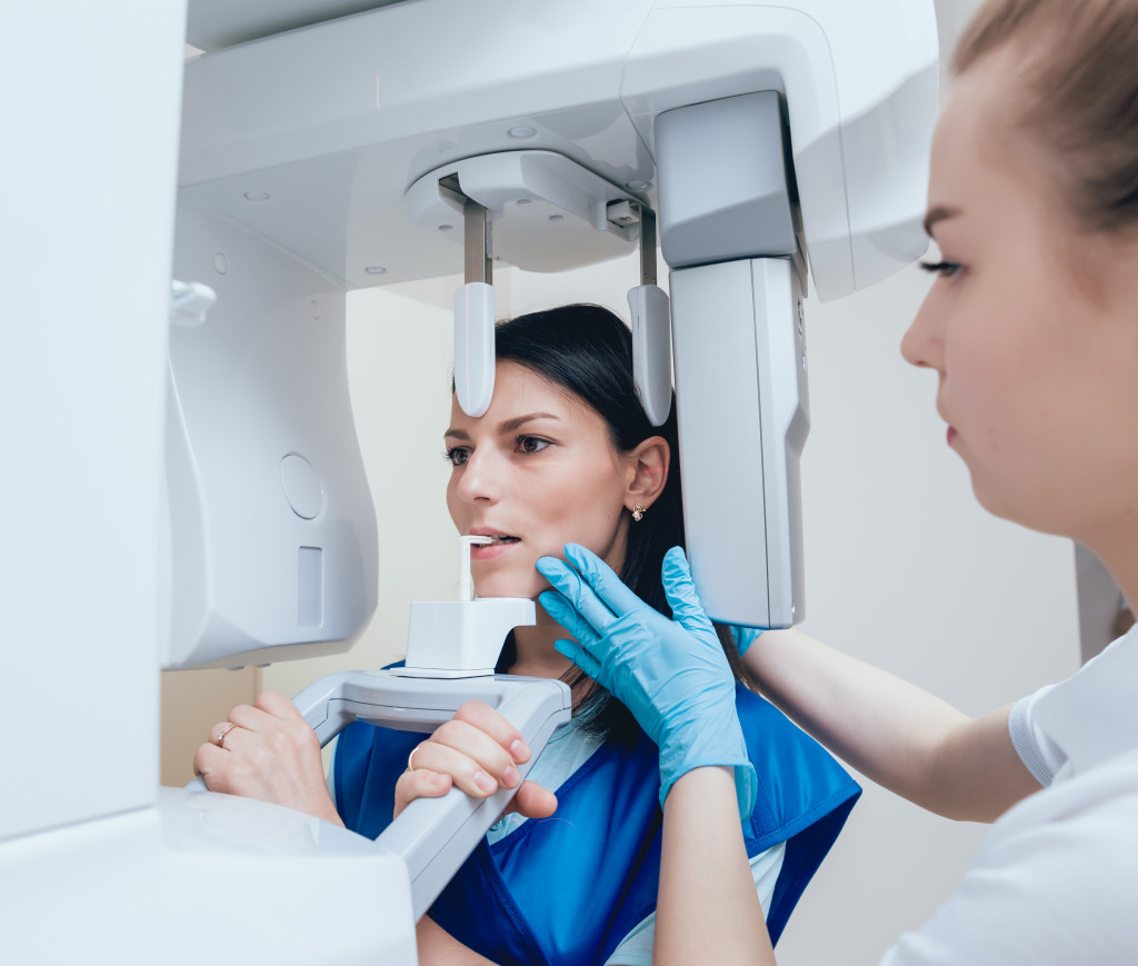 a woman getting a dental scan