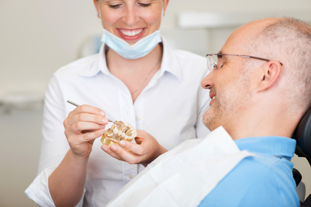 a dentist and her patient